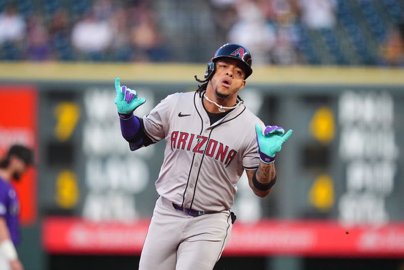 Sep 16, 2024; Denver, Colorado, USA; Arizona Diamondbacks second base Ketel Marte (4) celebrates his two run home run in the first inning against the Colorado Rockies at Coors Field. Mandatory Credit: Ron Chenoy-Imagn Images