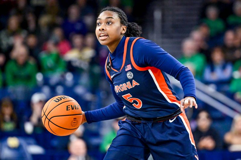 Jan 22, 2023; South Bend, Indiana, USA; Virginia Cavaliers guard Yonta Vaughn (5) passes in the first half against the Notre Dame Fighting Irish at the Purcell Pavilion. Mandatory Credit: Matt Cashore-USA TODAY Sports