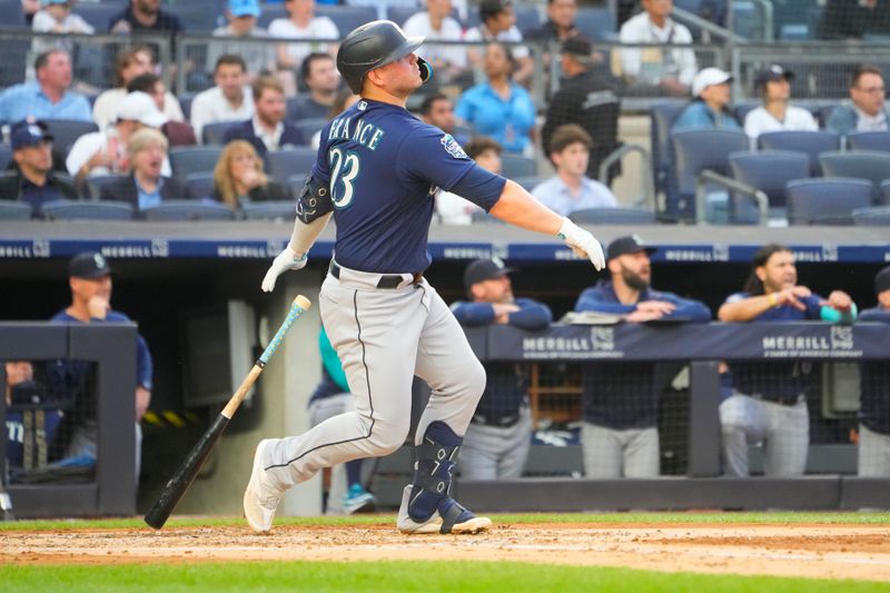 Jun 22, 2023; Bronx, New York, USA;  Seattle Mariners first baseman Ty France (23) hits a home run against the New York Yankees during the second inning at Yankee Stadium. Mandatory Credit: Gregory Fisher-USA TODAY Sports