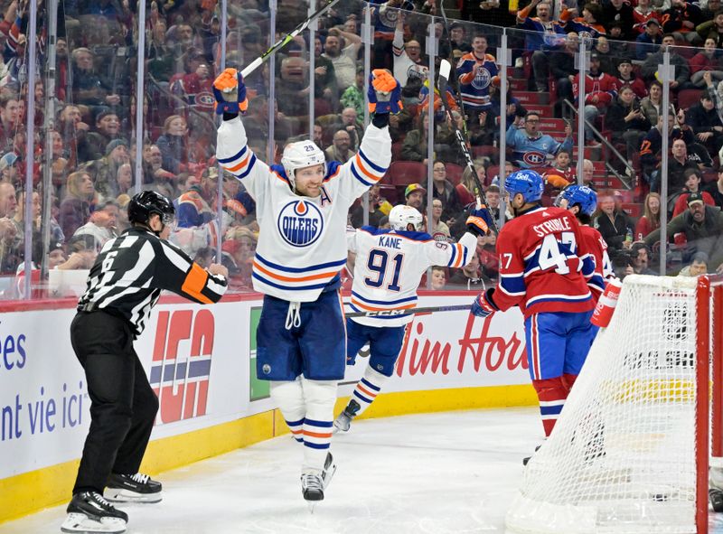 Jan 13, 2024; Montreal, Quebec, CAN; Edmonton Oilers forward Leon Draisaitl (29) celebrates after scoring a goal against the Montreal Canadiens during the third period at the Bell Centre. Mandatory Credit: Eric Bolte-USA TODAY Sports