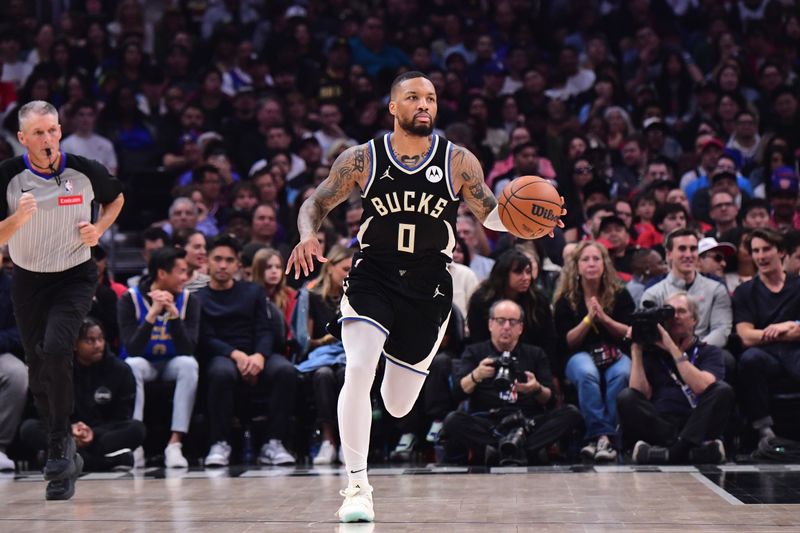 LOS ANGELES, CA - MARCH 10: Damian Lillard #0 of the Milwaukee Bucks dribbles the ball during the game against the LA Clippers on March 10, 2024 at Crypto.Com Arena in Los Angeles, California. NOTE TO USER: User expressly acknowledges and agrees that, by downloading and/or using this Photograph, user is consenting to the terms and conditions of the Getty Images License Agreement. Mandatory Copyright Notice: Copyright 2024 NBAE (Photo by Adam Pantozzi/NBAE via Getty Images)