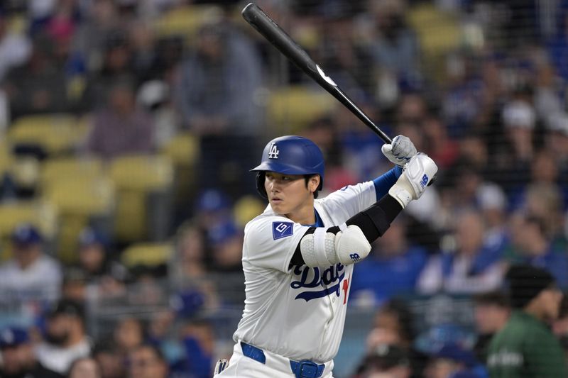 Apr 2, 2024; Los Angeles, California, USA;  Los Angeles Dodgers designated hitter Shohei Ohtani (17) waits on deck in the first inning against the San Francisco Giants at Dodger Stadium. Mandatory Credit: Jayne Kamin-Oncea-USA TODAY Sports