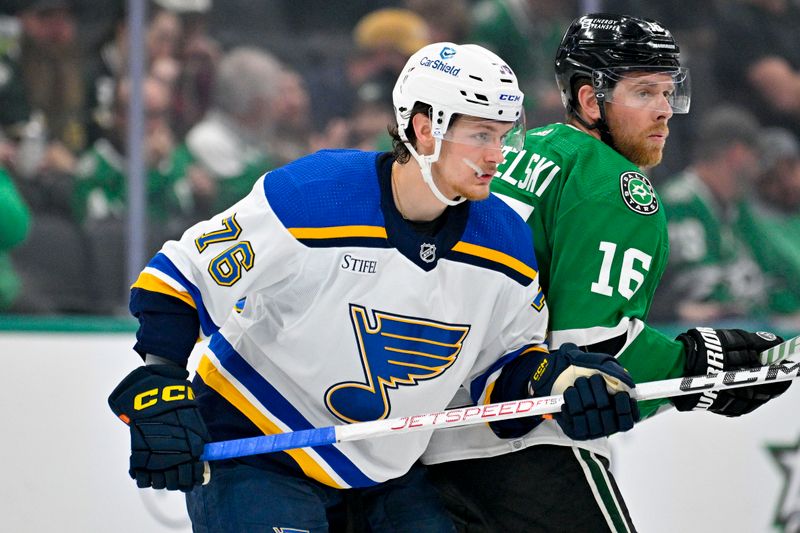 Apr 17, 2024; Dallas, Texas, USA; St. Louis Blues center Zack Bolduc (76) and Dallas Stars center Joe Pavelski (16) look for the puck at center ice during the second period at the American Airlines Center. Mandatory Credit: Jerome Miron-USA TODAY Sports