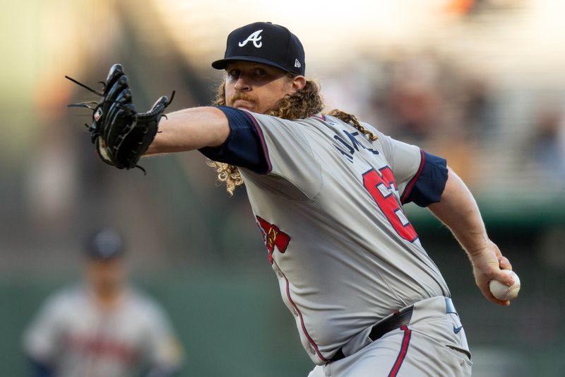 Aug 14, 2024; San Francisco, California, USA; Atlanta Braves pitcher starting Grant Holmes (66) delivers a pitch against the San Francisco Giants during the first inning at Oracle Park. Mandatory Credit: D. Ross Cameron-USA TODAY Sports