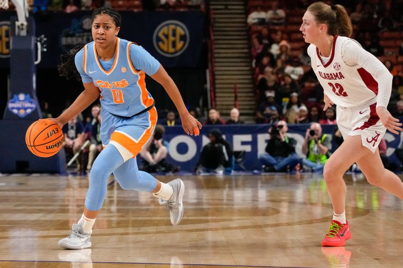 Mar 8, 2024; Greensville, SC, USA; Tennessee Lady Vols guard Jewel Spear (0) dribbles against the Alabama Crimson Tide during the second half at Bon Secours Wellness Arena. Mandatory Credit: Jim Dedmon-USA TODAY Sports