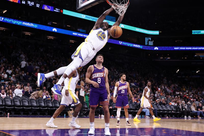 PHOENIX, ARIZONA - NOVEMBER 30: Draymond Green #23 of the Golden State Warriors dunks during the second half against the Phoenix Suns at Footprint Center on November 30, 2024 in Phoenix, Arizona. NOTE TO USER: User expressly acknowledges and agrees that, by downloading and or using this photograph, User is consenting to the terms and conditions of the Getty Images License Agreement.  (Photo by Chris Coduto/Getty Images)