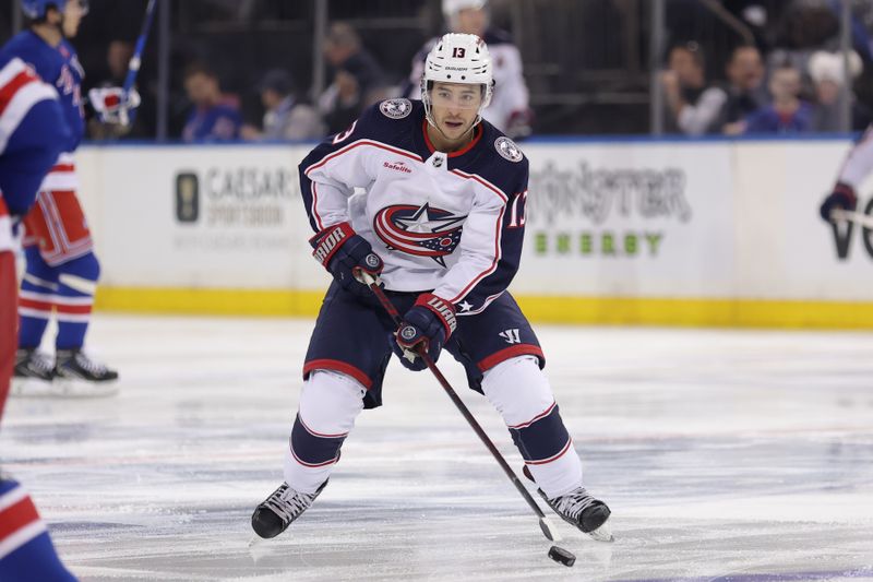 Feb 28, 2024; New York, New York, USA; Columbus Blue Jackets left wing Johnny Gaudreau (13) skates with the puck against the New York Rangers during the first period at Madison Square Garden. Mandatory Credit: Brad Penner-USA TODAY Sports