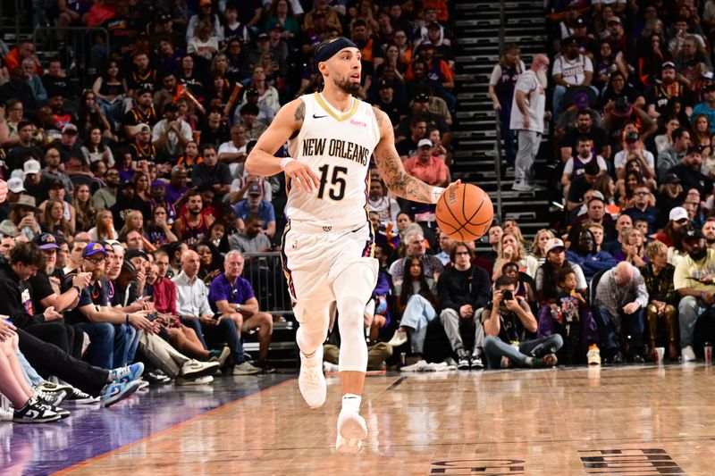 PHOENIX, AZ - APRIL 7: Jose Alvarado #15 of the New Orleans Pelicans dribbles the ball during the game against the Phoenix Suns on April 7, 2024 at Footprint Center in Phoenix, Arizona. NOTE TO USER: User expressly acknowledges and agrees that, by downloading and or using this photograph, user is consenting to the terms and conditions of the Getty Images License Agreement. Mandatory Copyright Notice: Copyright 2024 NBAE (Photo by Kate Frese/NBAE via Getty Images)