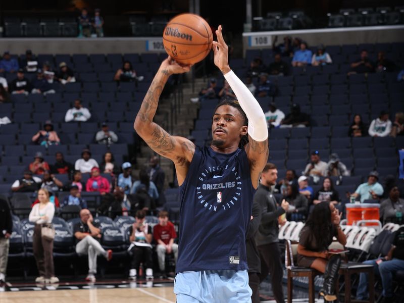 MEMPHIS, TN - OCTOBER 26: Ja Morant #12 of the Memphis Grizzlies warms up before the game against the Orlando Magic on October 26, 2024 at FedExForum in Memphis, Tennessee. NOTE TO USER: User expressly acknowledges and agrees that, by downloading and or using this photograph, User is consenting to the terms and conditions of the Getty Images License Agreement. Mandatory Copyright Notice: Copyright 2024 NBAE (Photo by Joe Murphy/NBAE via Getty Images)