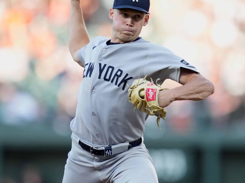 Apr 28, 2025; Baltimore, Maryland, USA; New York Yankees pitcher Will Warren (98) delivers during the first inning against the Baltimore Orioles at Oriole Park at Camden Yards. Mandatory Credit: Mitch Stringer-Imagn Images