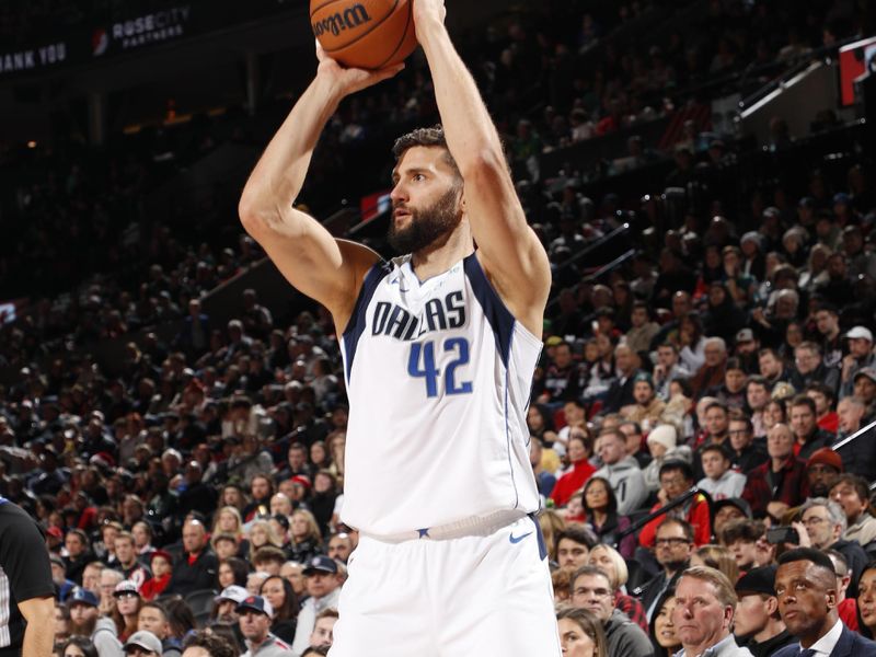 PORTLAND, OR - DECEMBER 1: Maxi Kleber #42 of the Dallas Mavericks shoots a three point basket during the game against the Portland Trail Blazers on December 1, 2024 at the Moda Center Arena in Portland, Oregon. NOTE TO USER: User expressly acknowledges and agrees that, by downloading and or using this photograph, user is consenting to the terms and conditions of the Getty Images License Agreement. Mandatory Copyright Notice: Copyright 2024 NBAE (Photo by Cameron Browne/NBAE via Getty Images)