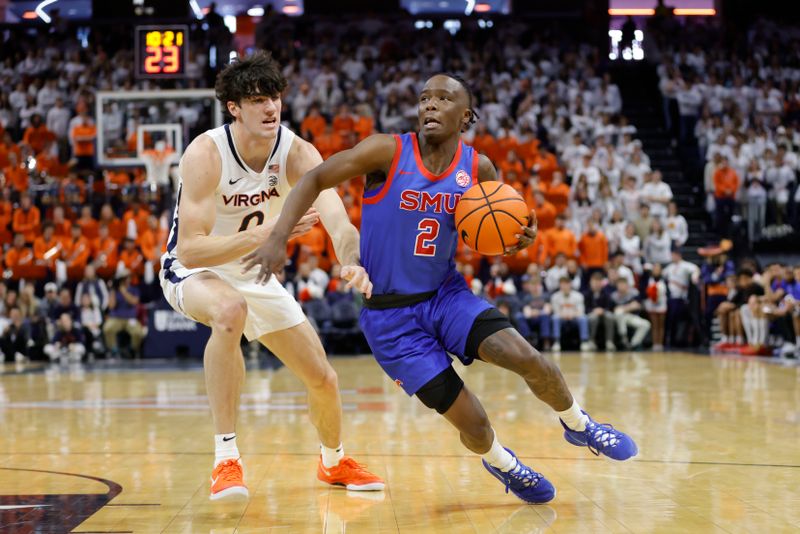 Jan 15, 2025; Charlottesville, Virginia, USA; Southern Methodist Mustangs guard Boopie Miller (2) controls the ball as Virginia Cavaliers forward Blake Buchanan (0) defends during the first half at John Paul Jones Arena. Mandatory Credit: Amber Searls-Imagn Images