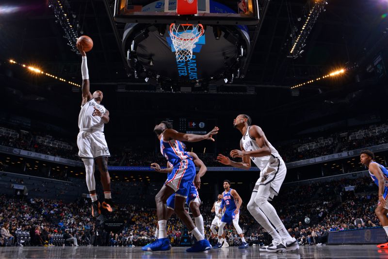 BROOKLYN, NY - MARCH 5: Lonnie Walker IV #8 of the Brooklyn Nets drives to the basket during the game against the Philadelphia 76ers on March 5, 2024 at Barclays Center in Brooklyn, New York. NOTE TO USER: User expressly acknowledges and agrees that, by downloading and or using this Photograph, user is consenting to the terms and conditions of the Getty Images License Agreement. Mandatory Copyright Notice: Copyright 2024 NBAE (Photo by Jesse D. Garrabrant/NBAE via Getty Images)