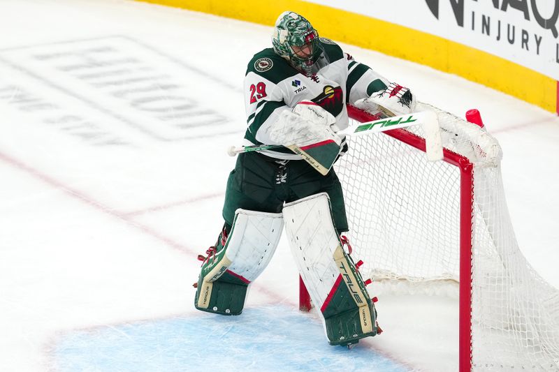 Apr 12, 2024; Las Vegas, Nevada, USA; Minnesota Wild goaltender Marc-Andre Fleury (29) bangs his stick on the crossbar in frustration after surrendering a seventh goal to the Vegas Golden Knights during the third period at T-Mobile Arena. Mandatory Credit: Stephen R. Sylvanie-USA TODAY Sports