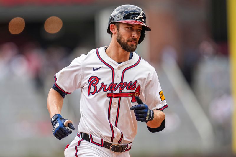 Apr 23, 2025; Cumberland, Georgia, USA; Atlanta Braves outfielder Eli White (36) reacts after hitting a three run home run against the St. Louis Cardinals during the eighth inning at Truist Park. Mandatory Credit: Dale Zanine-Imagn Images
