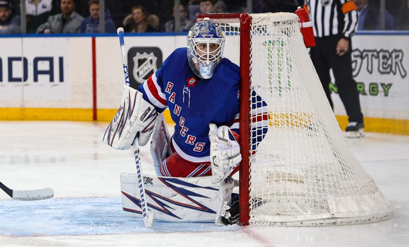 Nov 25, 2024; New York, New York, USA; New York Rangers goalie Igor Shesterkin (31) watches the puck against the St. Louis Blues during the third period at Madison Square Garden. Mandatory Credit: Danny Wild-Imagn Images