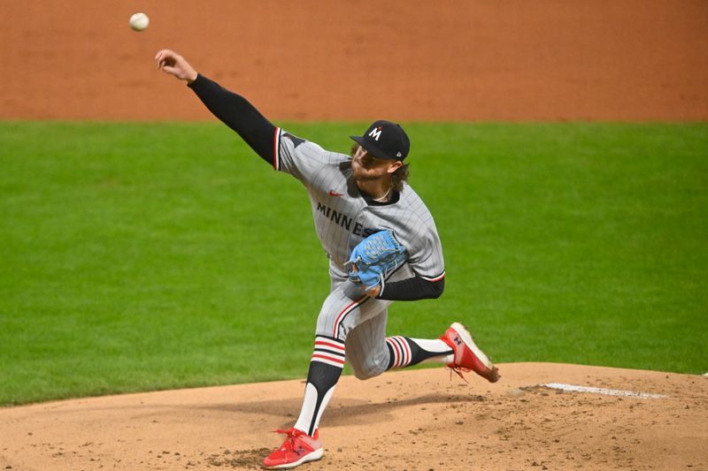 Apr 29, 2025; Cleveland, Ohio, USA; Minnesota Twins starting pitcher Chris Paddack (20) delivers a pitch in the first inning against the Cleveland Guardians at Progressive Field. Mandatory Credit: David Richard-Imagn Images