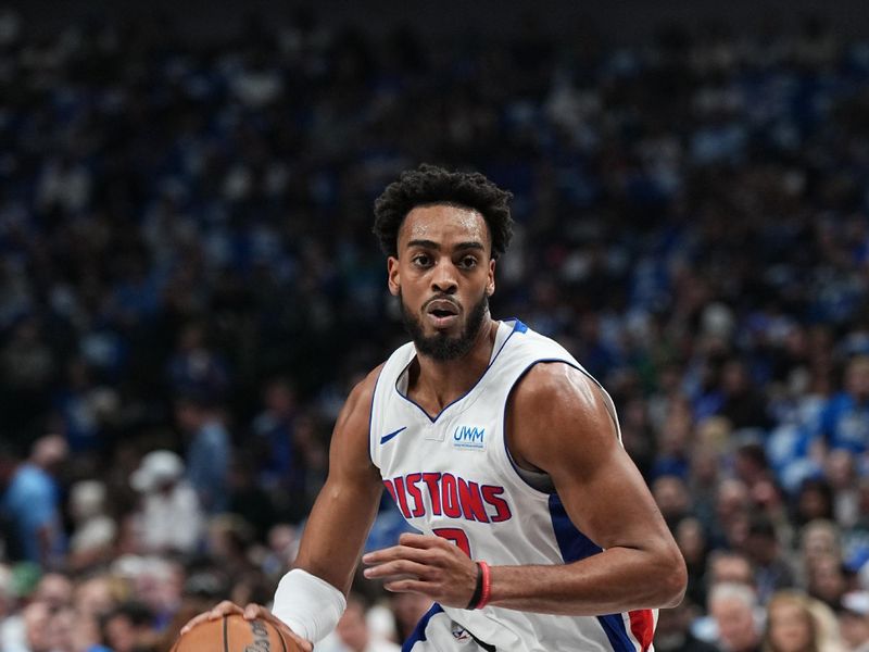 DALLAS, TX - APRIL 12: Troy Brown Jr. #7 of the Detroit Pistons dribbles the ball during the game against the Dallas Mavericks on April 12, 2024 at the American Airlines Center in Dallas, Texas. NOTE TO USER: User expressly acknowledges and agrees that, by downloading and or using this photograph, User is consenting to the terms and conditions of the Getty Images License Agreement. Mandatory Copyright Notice: Copyright 2024 NBAE (Photo by Glenn James/NBAE via Getty Images)