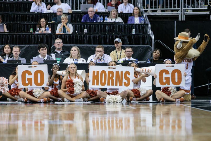 Mar 11, 2024; Kansas City, MO, USA; The Texas Longhorns cheer squad during the first half against the Texas Longhorns at T-Mobile Center. Mandatory Credit: William Purnell-USA TODAY Sports