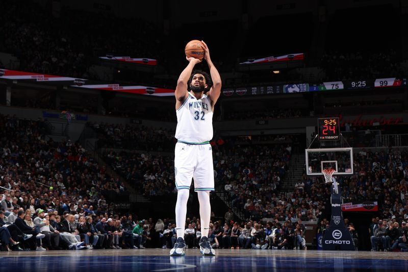 MINNEAPOLIS, MN -  JANUARY 3: Karl-Anthony Towns #32 of the Minnesota Timberwolves shoots a free throw during the game against the New Orleans Pelicans on January 3, 2024 at Target Center in Minneapolis, Minnesota. NOTE TO USER: User expressly acknowledges and agrees that, by downloading and or using this Photograph, user is consenting to the terms and conditions of the Getty Images License Agreement. Mandatory Copyright Notice: Copyright 2024 NBAE (Photo by David Sherman/NBAE via Getty Images)