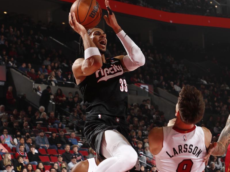 PORTLAND, OR - JANUARY 11:  Toumani Camara #33 of the Portland Trail Blazers shoots the ball during the game against the Miami Heat on January 11, 2025 at the Moda Center Arena in Portland, Oregon. NOTE TO USER: User expressly acknowledges and agrees that, by downloading and or using this photograph, user is consenting to the terms and conditions of the Getty Images License Agreement. Mandatory Copyright Notice: Copyright 2025 NBAE (Photo by Cameron Browne/NBAE via Getty Images)