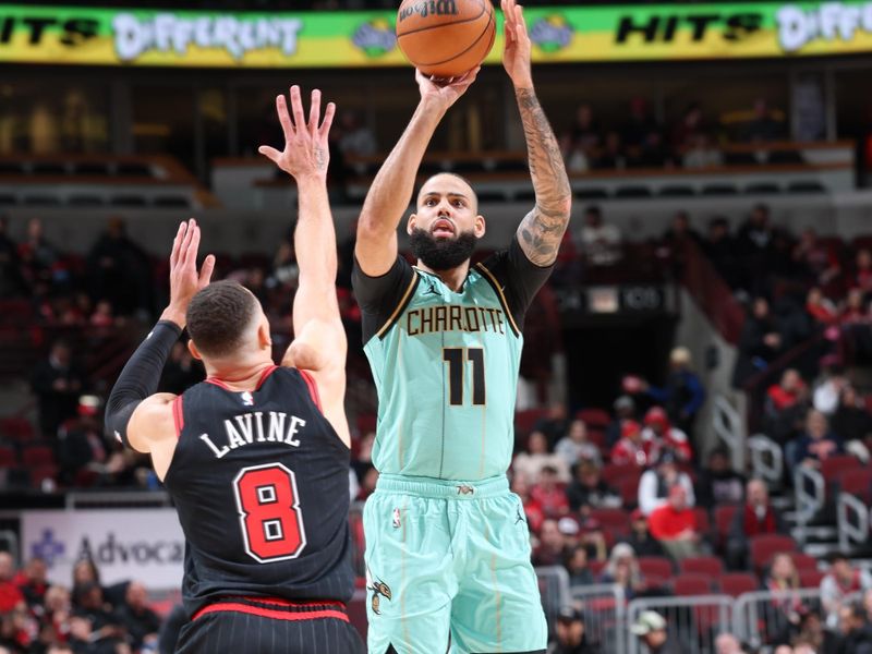 CHICAGO, IL - DECEMBER 13: Cody Martin #11 of the Charlotte Hornets shoots the ball during the game against the Chicago Bulls on December 13, 2024 at United Center in Chicago, Illinois. NOTE TO USER: User expressly acknowledges and agrees that, by downloading and or using this photograph, User is consenting to the terms and conditions of the Getty Images License Agreement. Mandatory Copyright Notice: Copyright 2024 NBAE (Photo by Jeff Haynes/NBAE via Getty Images)