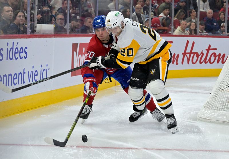 Oct 14, 2024; Montreal, Quebec, CAN; Pittsburgh Penguins forward Lars Eller (20) and Montreal Canadiens forward Juraj Slafkovsky (20) battle for the puck during the second period at the Bell Centre. Mandatory Credit: Eric Bolte-Imagn Images