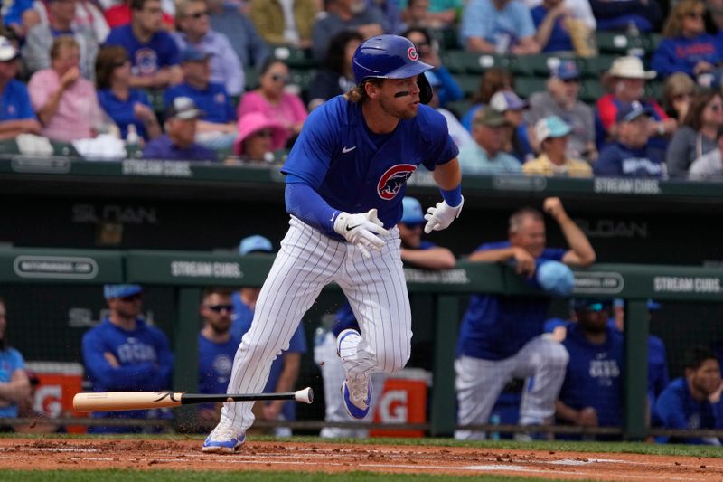 Mar 6, 2024; Mesa, Arizona, USA; Chicago Cubs second baseman Nico Hoerner (2) hits against the Los Angeles Angels in the first inning at Sloan Park. Mandatory Credit: Rick Scuteri-USA TODAY Sports