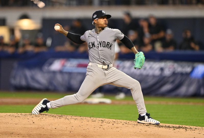 Aug 18, 2024; Williamsport, Pennsylvania, USA; New York Yankees starting pitcher Marcus Stroman (0) throws a pitch against the Detroit Tigers in the fifth inning at BB&T Ballpark at Historic Bowman Field. Mandatory Credit: Kyle Ross-USA TODAY Sports