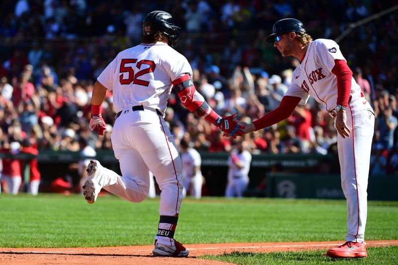 Sep 8, 2024; Boston, Massachusetts, USA;  Boston Red Sox right fielder Wilyer Abreu (52) is congratulated by Boston Red Sox third base coach Kyle Hudson (84) after hitting a home run during the sixth inning against the Chicago White Sox at Fenway Park. Mandatory Credit: Bob DeChiara-Imagn Images