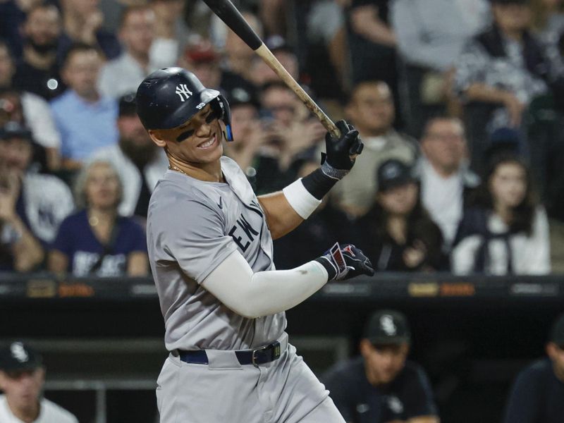 Aug 13, 2024; Chicago, Illinois, USA; New York Yankees outfielder Aaron Judge (99) reacts after striking out against the Chicago White Sox during the fifth inning at Guaranteed Rate Field. Mandatory Credit: Kamil Krzaczynski-USA TODAY Sports