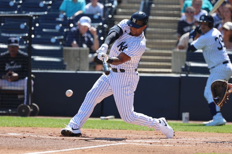 Feb 26, 2023; Tampa, Florida, USA; New York Yankees center fielder Aaron Hicks (31) singles during the first inning against the Atlanta Braves at George M. Steinbrenner Field. Mandatory Credit: Kim Klement-USA TODAY Sports