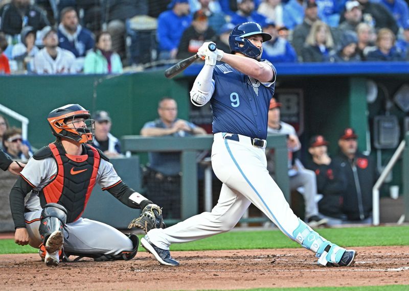 Apr 19, 2024; Kansas City, Missouri, USA; Kansas City Royals first baseman Vinnie Pasquantino (9) hits a solo home run in the fourth inning against the Baltimore Orioles at Kauffman Stadium. Mandatory Credit: Peter Aiken-USA TODAY Sports