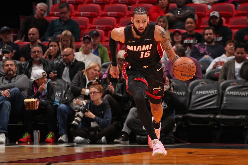 MIAMI, FL - FEBRUARY 6: Caleb Martin #16 of the Miami Heat dribbles the ball during the game against the Orlando Magic on February 6, 2024 at Kaseya Center in Miami, Florida. NOTE TO USER: User expressly acknowledges and agrees that, by downloading and or using this Photograph, user is consenting to the terms and conditions of the Getty Images License Agreement. Mandatory Copyright Notice: Copyright 2024 NBAE (Photo by Issac Baldizon/NBAE via Getty Images)