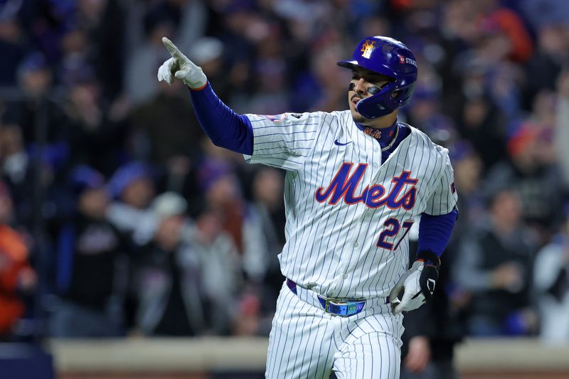 Oct 17, 2024; New York City, New York, USA; New York Mets third base Mark Vientos (27) reacts after hitting a home run against the Los Angeles Dodgers in the first inning during game four of the NLCS for the 2024 MLB playoffs at Citi Field. Mandatory Credit: Brad Penner-Imagn Images