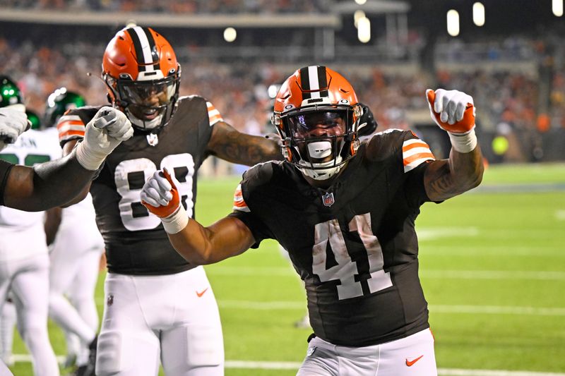 Cleveland Browns running back John Kelly Jr. (41) celebrates a touchdown during the first half of the NFL exhibition Hall of Fame football game against the New York Jets, Thursday, Aug. 3, 2023, in Canton, Ohio. (AP Photo/David Richard)