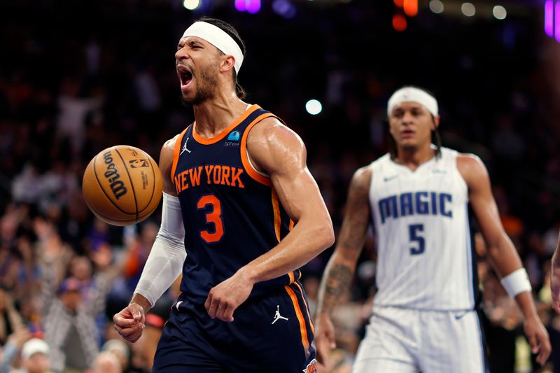 NEW YORK, NEW YORK - MARCH 08: Josh Hart #3 of the New York Knicks reacts after scoring during the second half against the Orlando Magic at Madison Square Garden on March 08, 2024 in New York City. The Knicks won 98-74. NOTE TO USER: User expressly acknowledges and agrees that, by downloading and or using this photograph, User is consenting to the terms and conditions of the Getty Images License Agreement. (Photo by Sarah Stier/Getty Images)