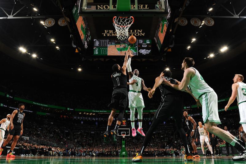 BOSTON, MA - FEBRUARY 14: Jrue Holiday #4 of the Boston Celtics drives to the basket during the game against the Brooklyn Nets on February 14, 2024 at the TD Garden in Boston, Massachusetts. NOTE TO USER: User expressly acknowledges and agrees that, by downloading and or using this photograph, User is consenting to the terms and conditions of the Getty Images License Agreement. Mandatory Copyright Notice: Copyright 2024 NBAE  (Photo by Brian Babineau/NBAE via Getty Images)