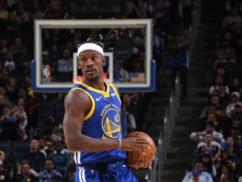 SAN FRANCISCO, CA - MARCH 10:  Jimmy Butler #10 of the Golden State Warriors dribbles the ball during the game against the Portland Trail Blazers on March 10, 2025 at Chase Center in San Francisco, California. NOTE TO USER: User expressly acknowledges and agrees that, by downloading and or using this photograph, user is consenting to the terms and conditions of Getty Images License Agreement. Mandatory Copyright Notice: Copyright 2025 NBAE (Photo by Noah Graham/NBAE via Getty Images)