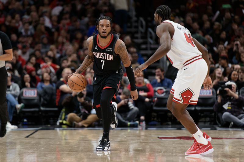 CHICAGO, ILLINOIS - JANUARY 10:  Cam Whitmore #7 of the Houston Rockets controls the ball against the Chicago Bulls on January 10, 2024 at United Center in Chicago, Illinois.  NOTE TO USER: User expressly acknowledges and agrees that, by downloading and or using this photograph, User is consenting to the terms and conditions of the Getty Images License Agreement.  (Photo by Jamie Sabau/Getty Images)