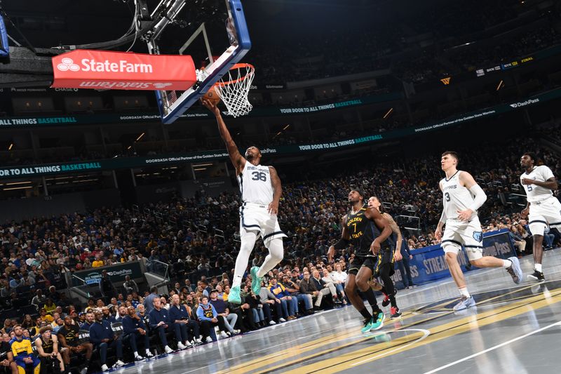 SAN FRANCISCO, CA - NOVEMBER 15: Marcus Smart #36 of the Memphis Grizzlies drives to the basket during the game against the Golden State Warriors during the Emirates NBA Cup game on November 15, 2024 at Chase Center in San Francisco, California. NOTE TO USER: User expressly acknowledges and agrees that, by downloading and or using this photograph, user is consenting to the terms and conditions of Getty Images License Agreement. Mandatory Copyright Notice: Copyright 2024 NBAE (Photo by Noah Graham/NBAE via Getty Images)