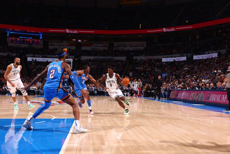 OKLAHOMA CITY, OK - JANUARY 29: Anthony Edwards #5 of the Minnesota Timberwolves handles the ball during the game against the Oklahoma City Thunder on January 29, 2024 at Paycom Arena in Oklahoma City, Oklahoma. NOTE TO USER: User expressly acknowledges and agrees that, by downloading and or using this photograph, User is consenting to the terms and conditions of the Getty Images License Agreement. Mandatory Copyright Notice: Copyright 2024 NBAE (Photo by Zach Beeker/NBAE via Getty Images)