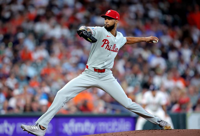 Jun 26, 2025; Houston, Texas, USA; Philadelphia Phillies starting pitcher Cristopher Sanchez (61) delivers a pitch against the Houston Astros during the first inning at Daikin Park. Mandatory Credit: Erik Williams-Imagn Images