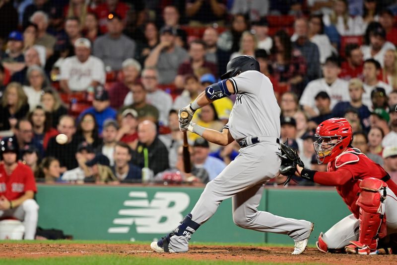 Sep 14, 2023; Boston, Massachusetts, USA; New York Yankees third baseman Oswald Peraza (91) hits a two run home run against the Boston Red Sox during the ninth inning at Fenway Park. Mandatory Credit: Eric Canha-USA TODAY Sports