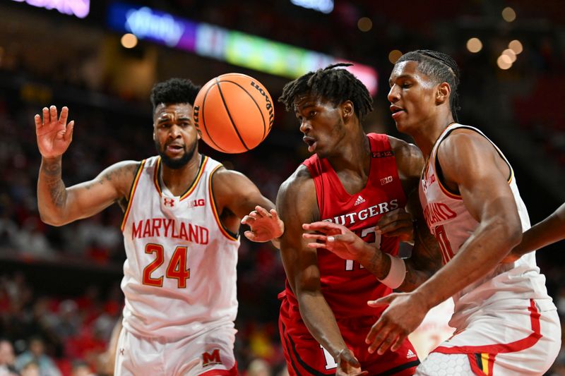 Feb 6, 2024; College Park, Maryland, USA; Rutgers Scarlet Knights forward Antwone Woolfolk (13) and Maryland Terrapins forward Julian Reese (10) look at a  loose ball during the first half  at Xfinity Center. Mandatory Credit: Tommy Gilligan-USA TODAY Sports