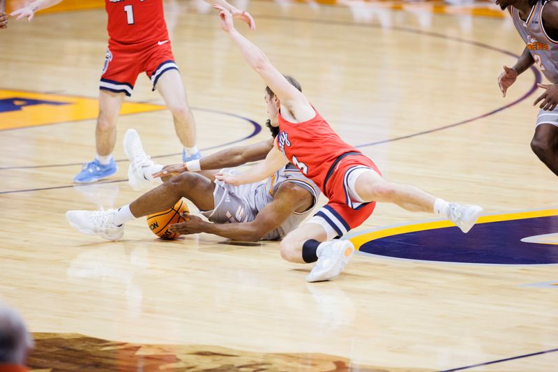 Feb 3, 2024; El Paso, Texas, USA; UTEP Miners guard Otis Frazier III (23) and Liberty University Flames guard Kaden Metheny (3) battle for a loose ball in the second half at Don Haskins Center. Mandatory Credit: Ivan Pierre Aguirre-USA TODAY Sports