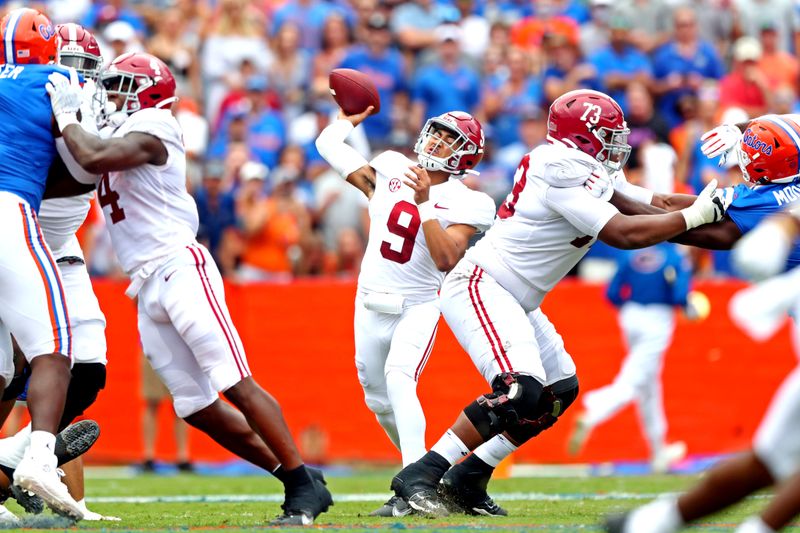 Sep 18, 2021; Gainesville, Florida, USA; Alabama Crimson Tide quarterback Bryce Young (9) throws a pass during the first quarter against the Florida Gators at Ben Hill Griffin Stadium. Mandatory Credit: Mark J. Rebilas-USA TODAY Sports