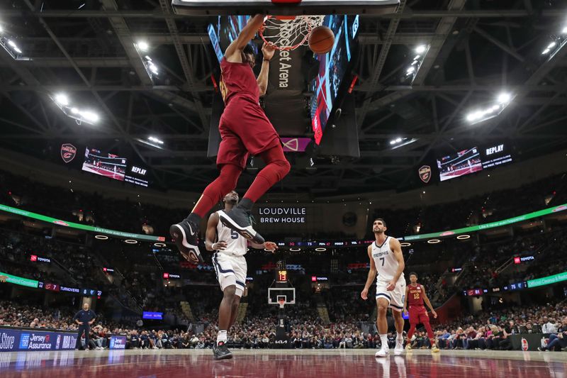 CLEVELAND, OH - FEBRUARY 23: Jarrett Allen #31 of the Cleveland Cavaliers dunks the ball during the game against the Memphis Grizzlies on February 23, 2025 at Rocket Arena in Cleveland, Ohio. NOTE TO USER: User expressly acknowledges and agrees that, by downloading and/or using this Photograph, user is consenting to the terms and conditions of the Getty Images License Agreement. Mandatory Copyright Notice: Copyright 2025 NBAE (Photo by Joe Murphy/NBAE via Getty Images)