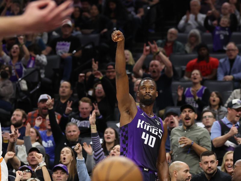 SACRAMENTO, CALIFORNIA - DECEMBER 22: Harrison Barnes #40 of the Sacramento Kings watches a three-point basket go in against the Phoenix Suns at Golden 1 Center on December 22, 2023 in Sacramento, California. NOTE TO USER: User expressly acknowledges and agrees that, by downloading and or using this photograph, User is consenting to the terms and conditions of the Getty Images License Agreement.  (Photo by Ezra Shaw/Getty Images)