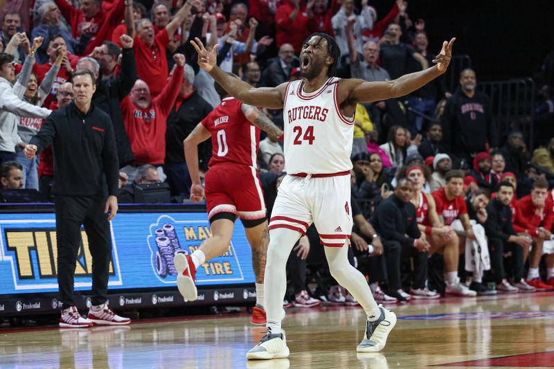 Jan 17, 2024; Piscataway, New Jersey, USA; Rutgers Scarlet Knights guard Austin Williams (24) reacts after making a three point basket during overtime against the Nebraska Cornhuskers  at Jersey Mike's Arena. Mandatory Credit: Vincent Carchietta-USA TODAY Sports